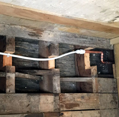 water pipe slots in joists - way over sized